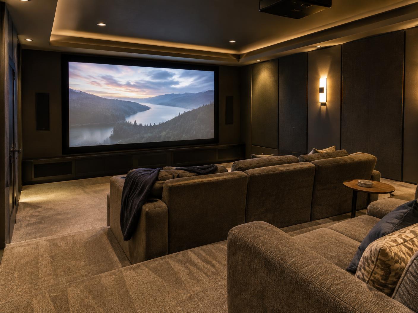 Dedicated home theater with projection screen and concealed wiring